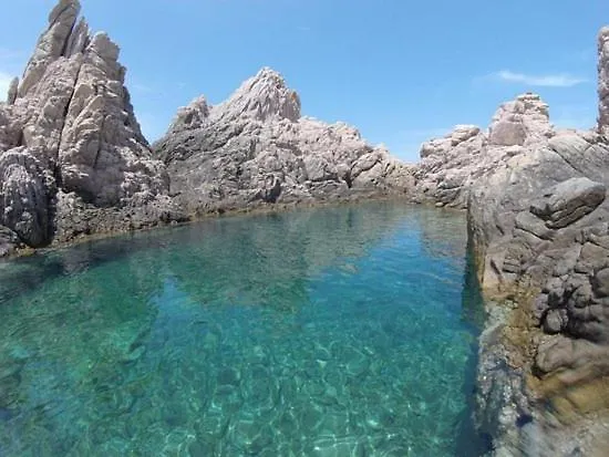 شقة Calarossa Bay ايزولا روسا